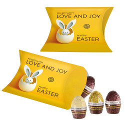 Promo-Kissenverpackung mit Ferrero Rocher Eiern Promo-Kissenverpackung mit Ferrero Rocher Eiern