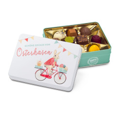 Geschenkartikel / Präsentartikel: Hasenvater auf dem Fahrrad - Pralinendose mit 125 g Geschenkartikel / Präsentartikel: Hasenvater auf dem Fahrrad - Pralinendose mit 125 g